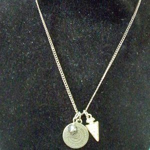 THREE SILVER CHARMS ON A SILVER TONE CHAIN